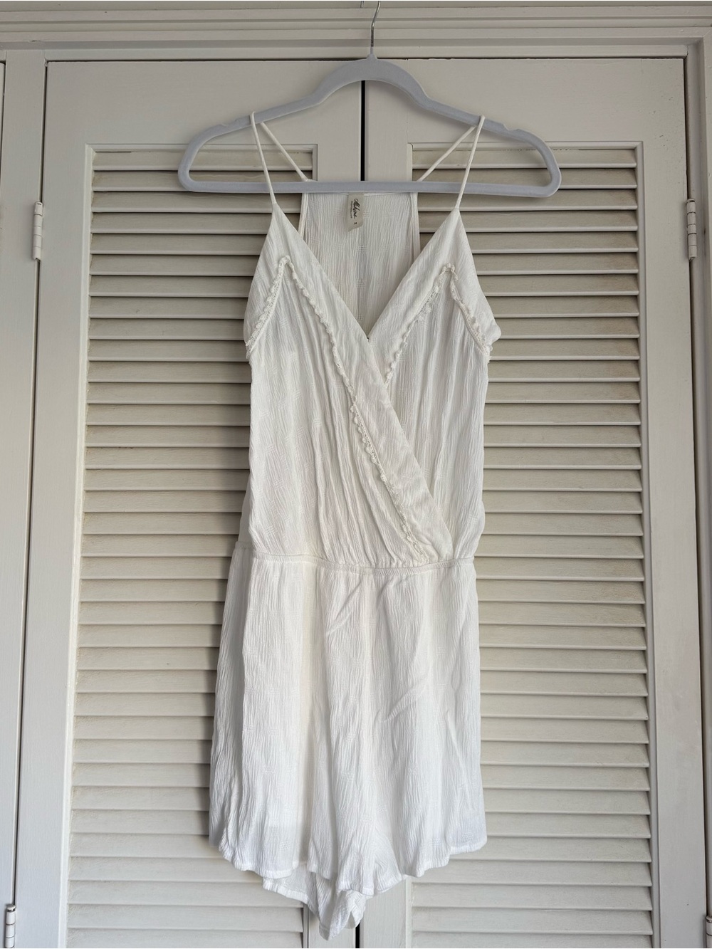 mahina White Sleeveless Wrap Romper